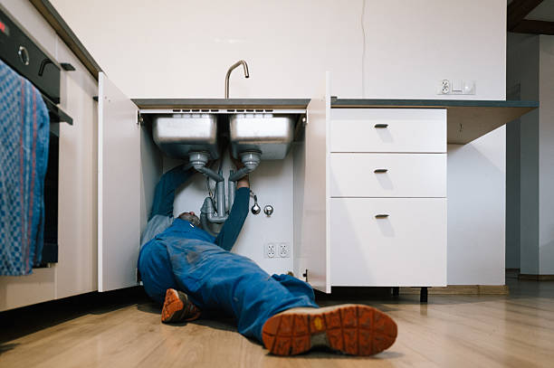 Professional Drain Cleaning technician working in Lineville, AL